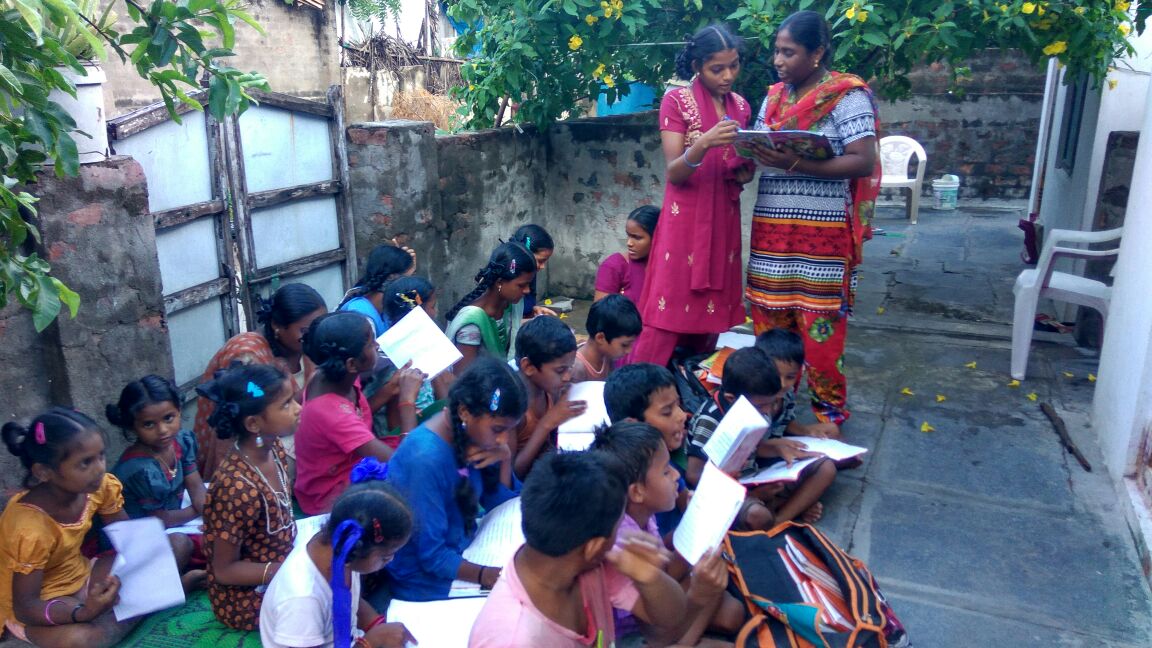 Vasavi-conducting_tuitions_-_standing_right